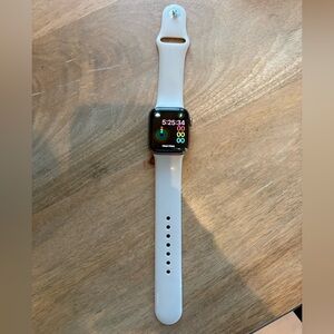 Apple Watch Series 4 40MM with beige Band and charger